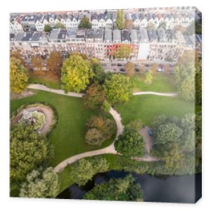 Aerial view of Amsterdam city roofs beside Sarphati park 