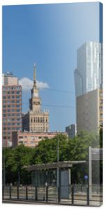 Warsaw cityscape - view of the street and skyscrapers in the center on a sunny day