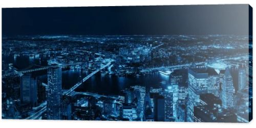 Rooftop night panorama view of New York City downtown with urban skyscrapers