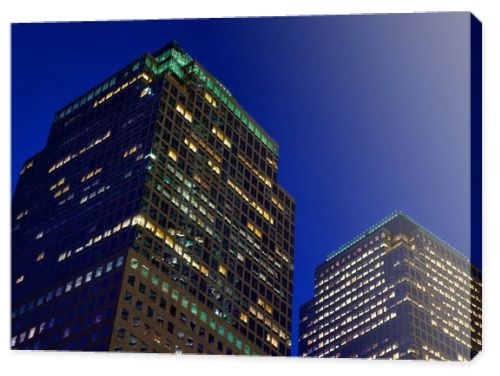 Bottom up view on glass skyscrapers NY USA night