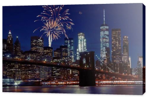 Fireworks over New York City skyline and Brooklyn Bridge