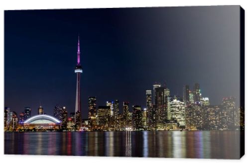 Night View of Downtown Toronto from Toronto Islands with the Lake Ontario, Canada.