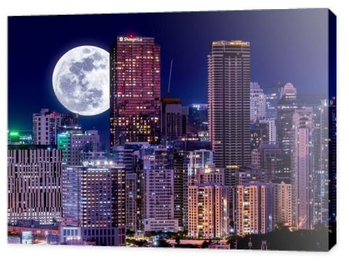 Metro Manila - Evening shot of Bonifacio Global City as seen from Makati. Full Moon behind beautiful skyline