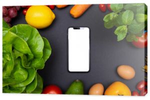 Telefon z białego źródła i miejsce na tekst roślinny i owocami diety i odżywianie