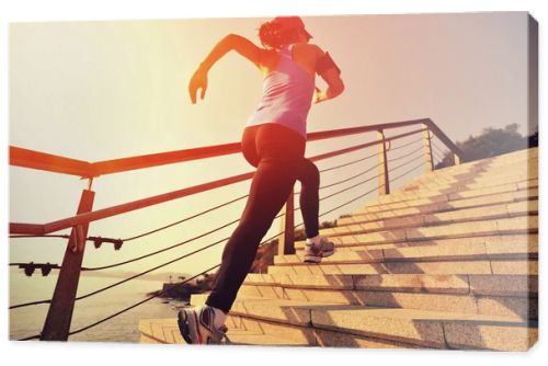 Runner athlete running up stairs