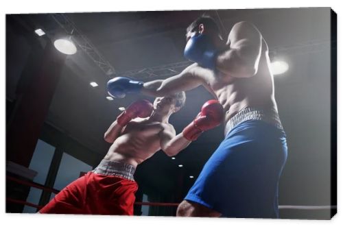 Fighting in boxing ring