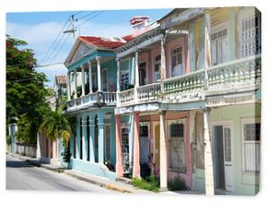 Historic Jamaican buildings in classic Georgian style architecture, lining the streets of downtown Kingston.