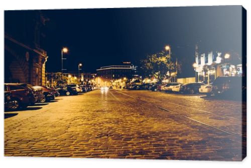 Cobblestone street in Fells Point at night, Baltimore, Maryland.