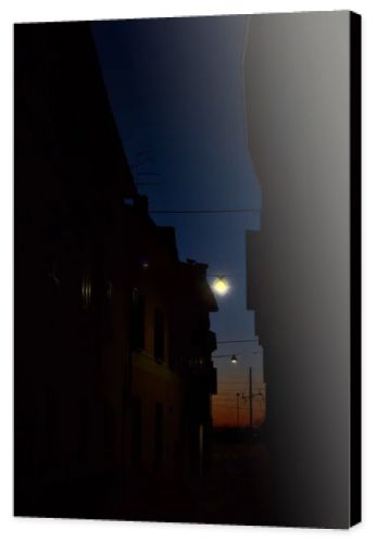 Sky at sunset in autumn framed by buildings