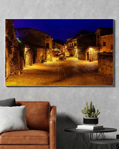 Panoramic view of the stone village with stone houses at dusk. Santander, Santillana del Mar.