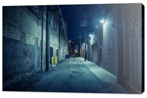 Dark and eerie urban city alley at night