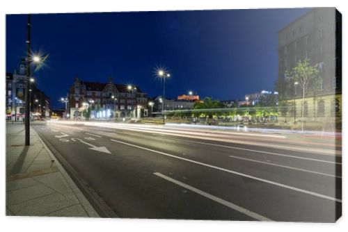 One of the central streets of Katowice after sunset