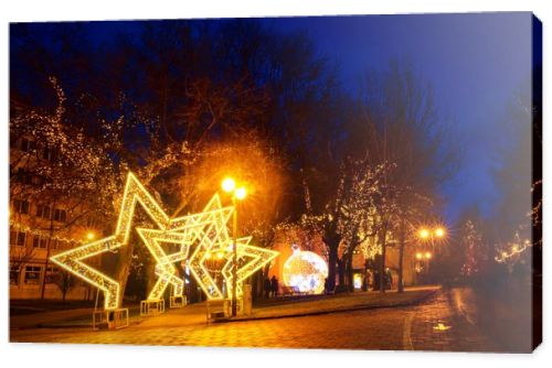 POPRAD, SLOVAKIA - Januar 2018 - St. Egidius street at night with christmas decorations and lights, Poprad, Slovakia, Europe. 