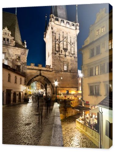 Charles Bridge Tower on a rainy night in Prague
