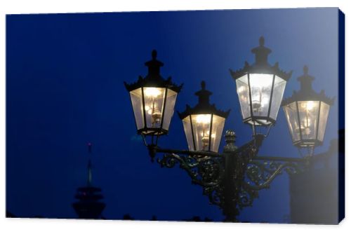 old lantern on the background of the city