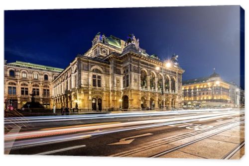 Wien opera building facade at night and traffic trails