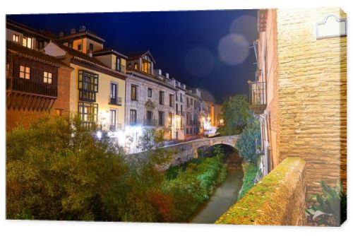 Darro carrera street river and arch in Granada of Spain at Andalusia