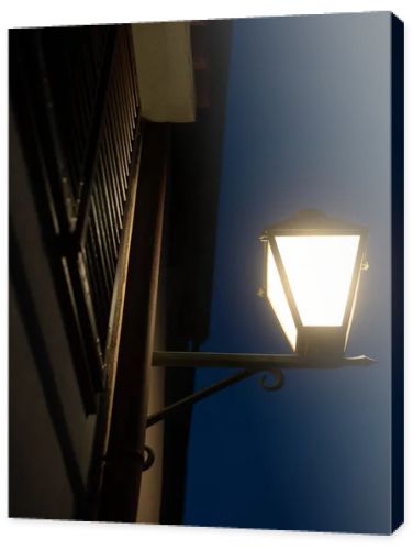 Street lamp in the city of Cres in the evening