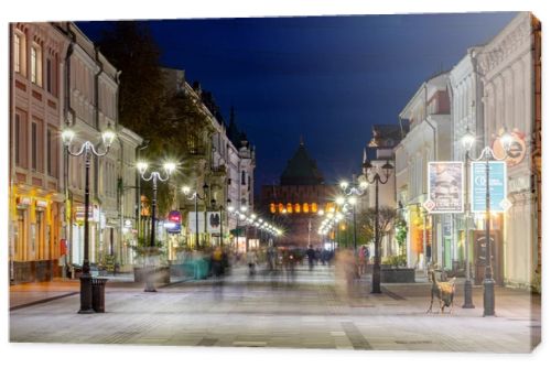 Nizhny Novgorod / Russia - October 16, 2019: Bolshaya Pokrovskaya street. The light of the street lamps. City at dusk. Evening cityscape. Long exposure.