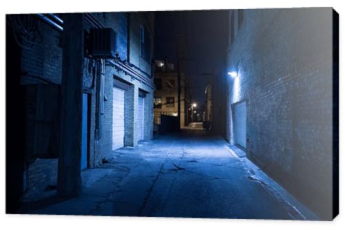 Dark and eerie urban city alley at night