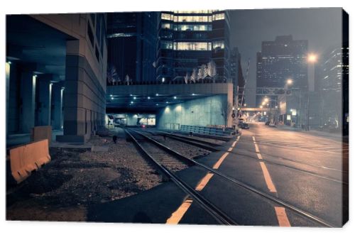 Dark urban downtown city train tunnel at night
