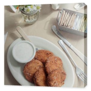 Country style fried green tomatoes on inside of a restaurant