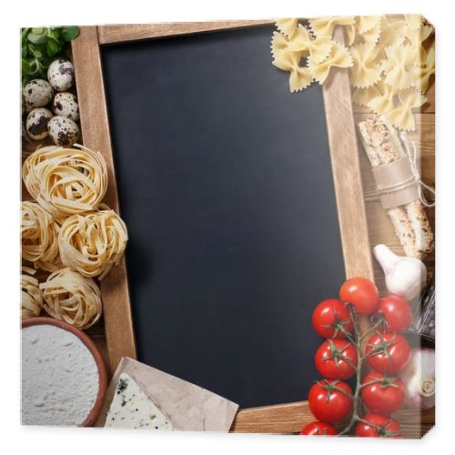 Italian food on vintage wood background with chalkboard