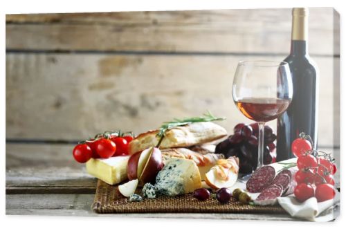 Still life with various types of Italian food and wine