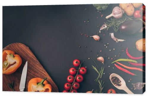 top view of vegetable ingredients for dish on gray table