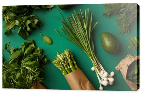 top view of various ripe vegetables on green surface