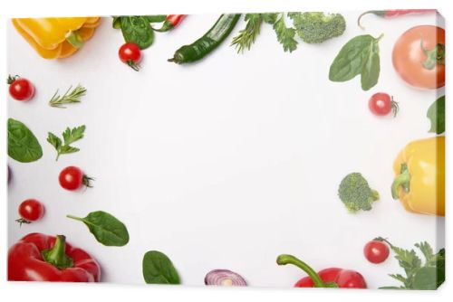 Flat lay with organic vegetables on white background