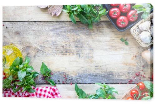 Fresh tasty vegetables for cooking or salad on a rustic background, top view, frame. Diet or vegetarian food concept. Top view.