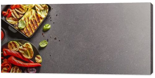 Plate and baking dish with tasty grilled vegetables on dark background with space for text