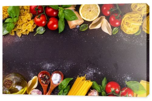 Various pasta with spices and ingredients for cooking. Preparation dinner, lunch background with fresh basil, tomatoes, spices, garlic and different sort and types of italian Mediterranean pasta
