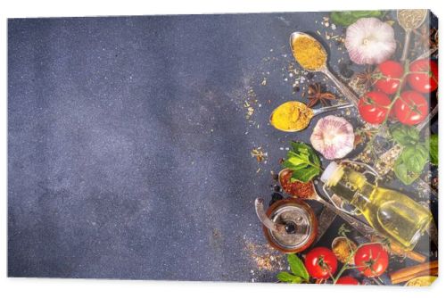 Spices for cooking on dark background . Different seasonings, spices and herbs paprika, pepper, turmeric, salt, basil, mint, cinnamon, garlic, olive oil, aromatic ingredients for preparation food